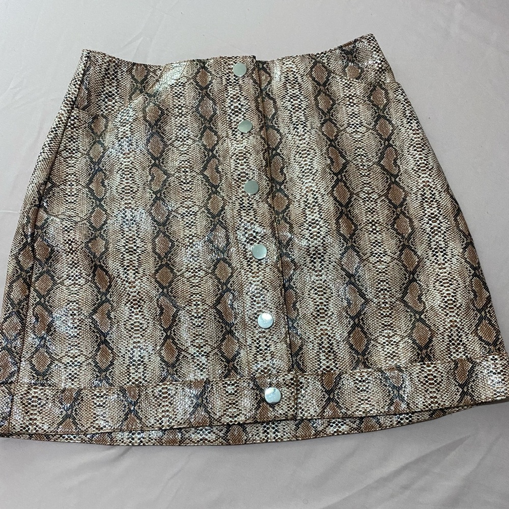 Python Mini Skirt With Pockets And Snap Buttons - image 1